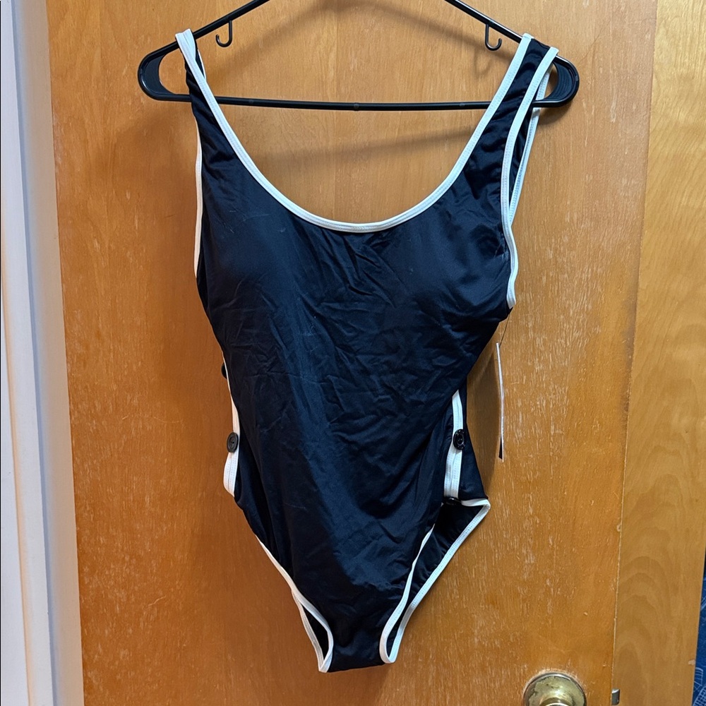 DKNY new with tags cute one piece swimsuit.